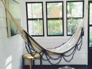 indoor hammock hanging in sunroom