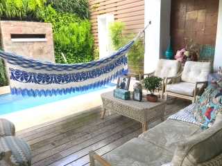 indoor hammock hanging on a patio