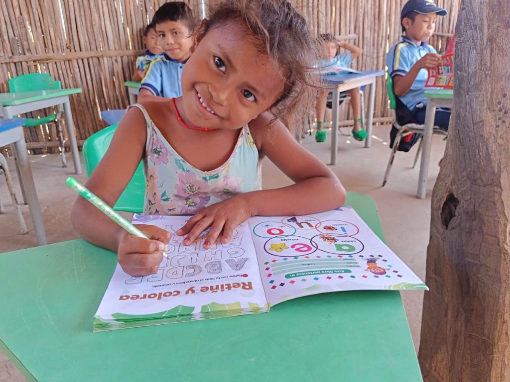 Wayuu girl reading